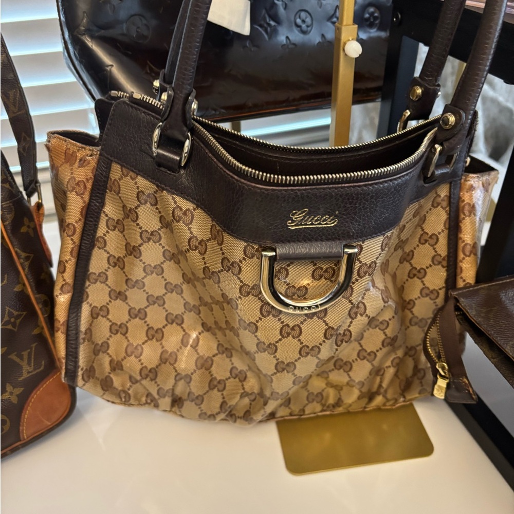 Gucci Abbey Coated Canvas